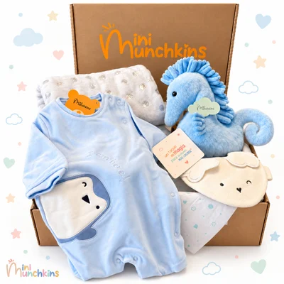 Set azul con pingüino · fotografía del catálogo de Mini Munchkins