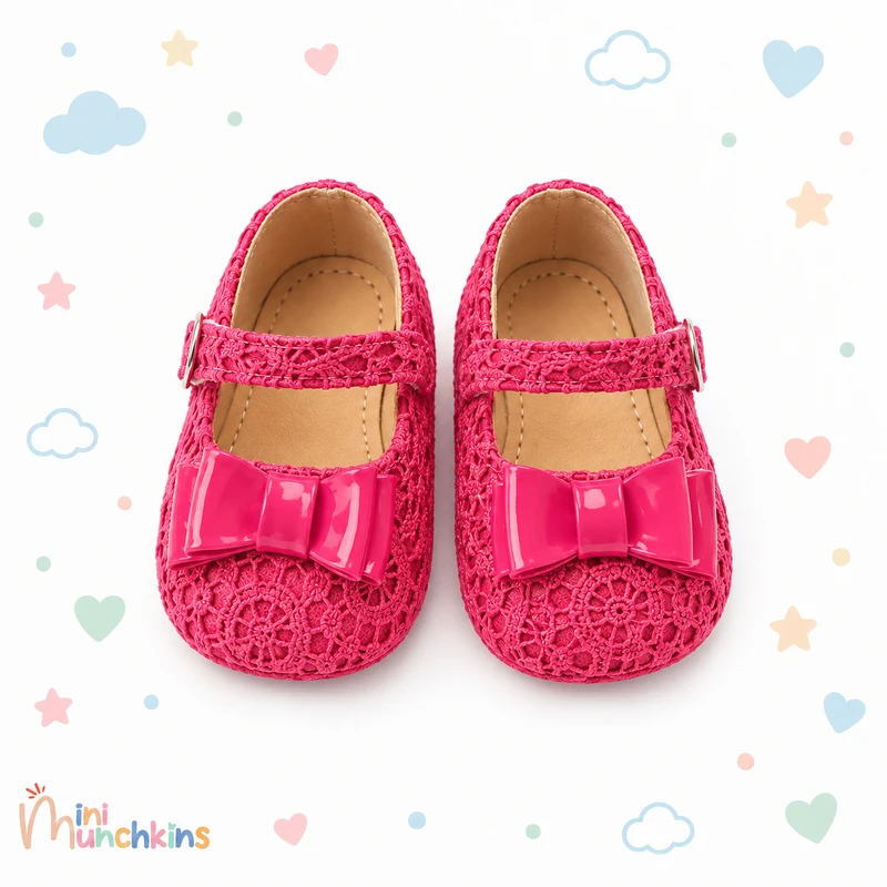 Zapatos rosas con moño · fotografía del catálogo de Mini Munchkins