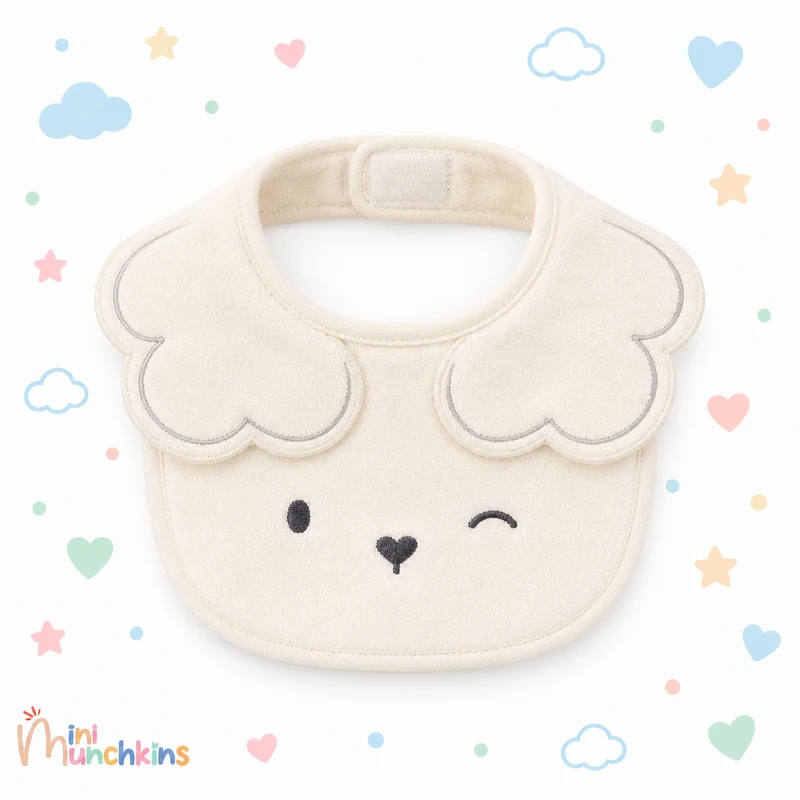 Babero crema · fotografía del catálogo de Mini Munchkins